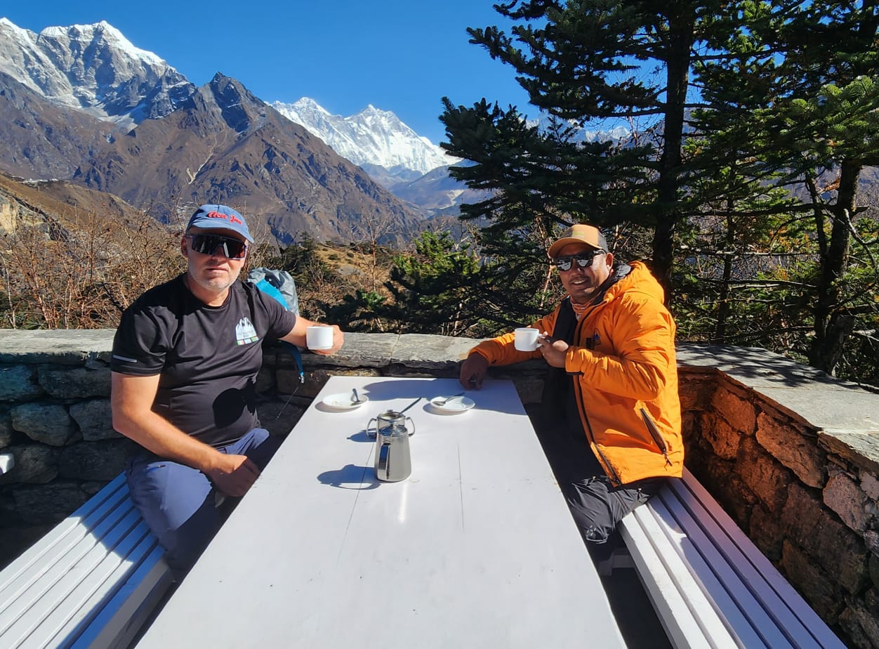 Drinking Coffee With A Guide On EBC Trek 